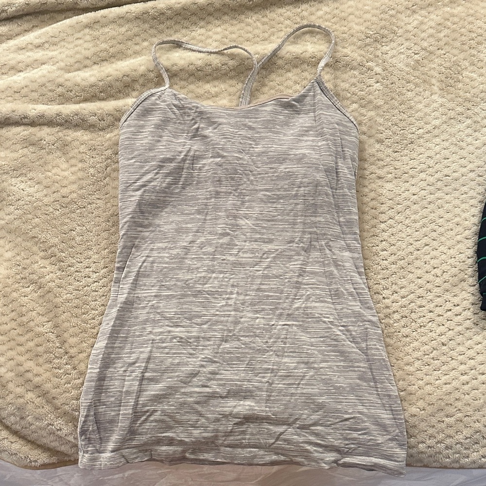 Women's Lululemon Power Y Tank in a heathered gray color and Luon fabric